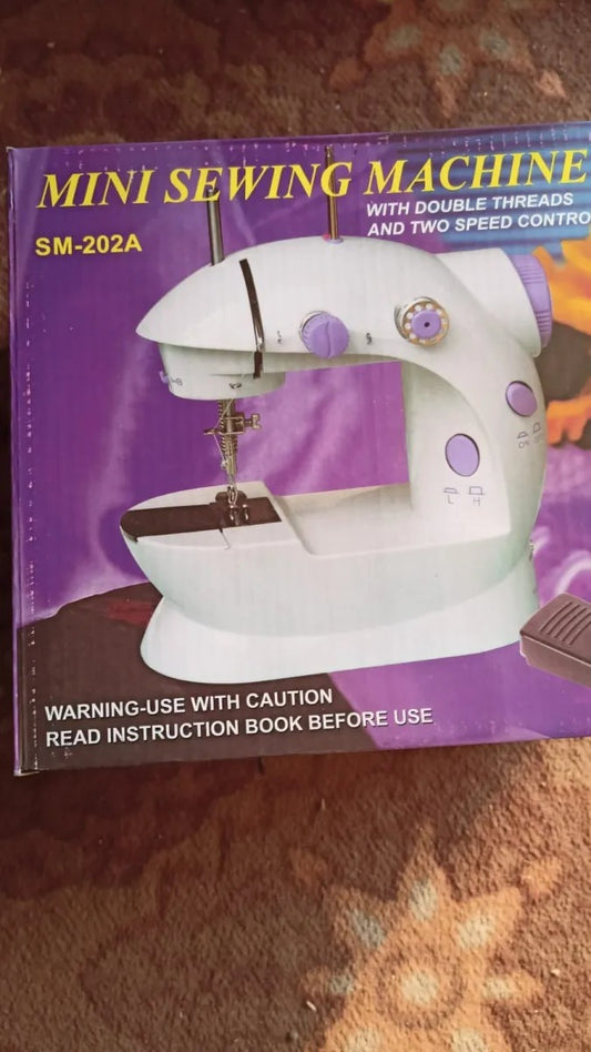 SM-202A Electric Mini Sewing Machine – Double Threads & Two Speed Control for Home & Travel